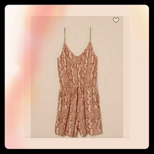 Snakeskin print romper.